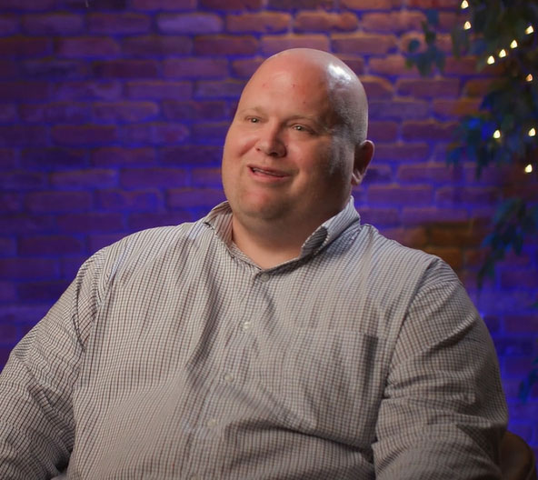 Man being interviewed